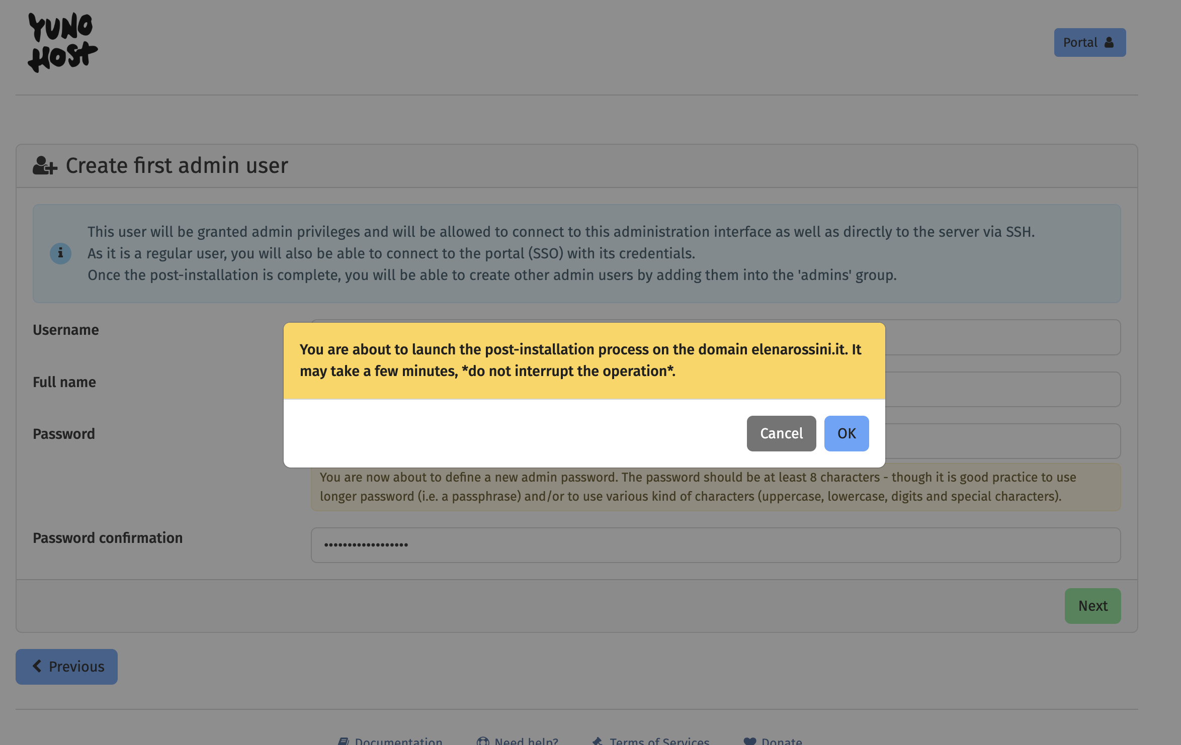 a screenshot of the previous web page with create admin user... the page is set to opacity with a rectangle with a yellow background that reads: You are about to launch the post-installation process on the domain elenarossini.it. It may take a few minutes, do not interrupt the operation." and two buttons: Cancel and OK