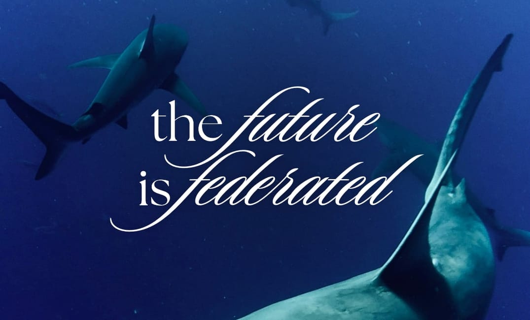 a photo of sharks swimming in the sea with the title "the future is federated" on top